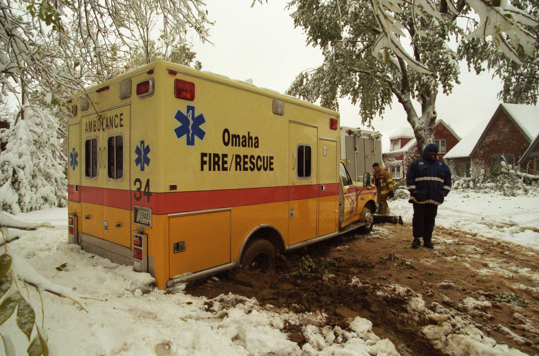 This Omaha rescue squad unit got stuck in the mud on its way to reach a person who was struck by a tree limb near 54th and Blondo Streets. The victim was not seriously injured.